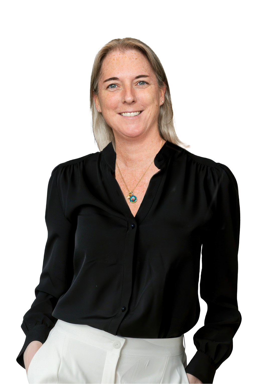 Smiling woman in black blouse and necklace.